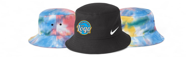 Three stylish bucket hats: two with vibrant tie-dye designs and one solid black featuring a custom logo patch