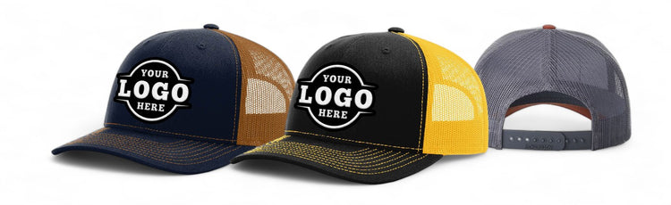 Trio of Richardson 112 trucker hats in navy/gold, black/yellow, and gray, each featuring a customizable logo patch