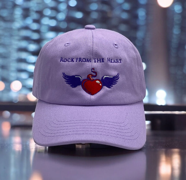 Light purple hat with 'Rock From The Heart' logo.