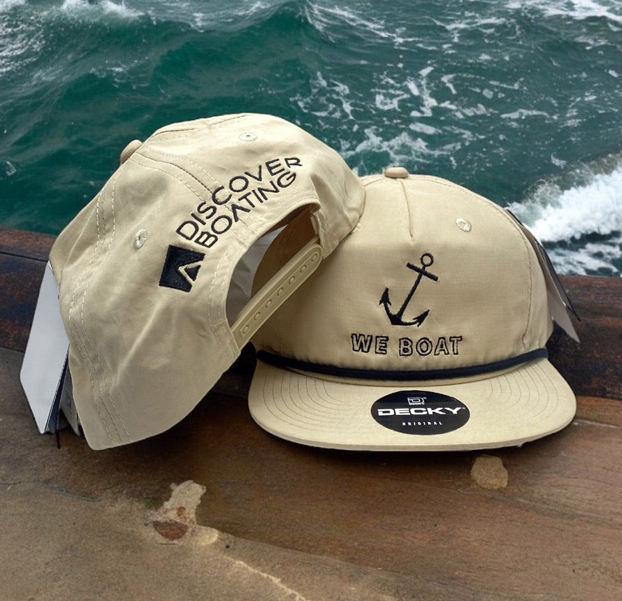 Two beige Decky hats with 'Discover Boating' and 'We Boat' logos.