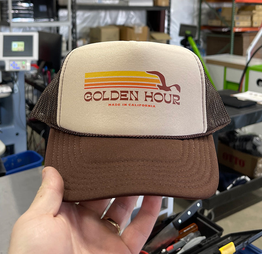 Brown and tan hat with 'Golden Hour Made in California' logo.