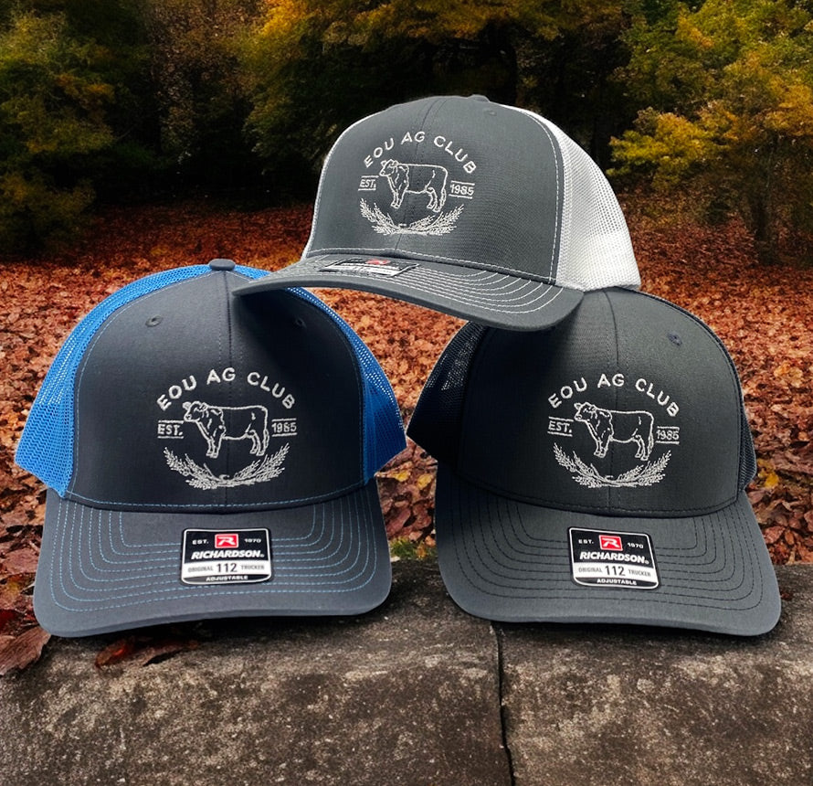Three EOU AG Club trucker hats in grey and blue.