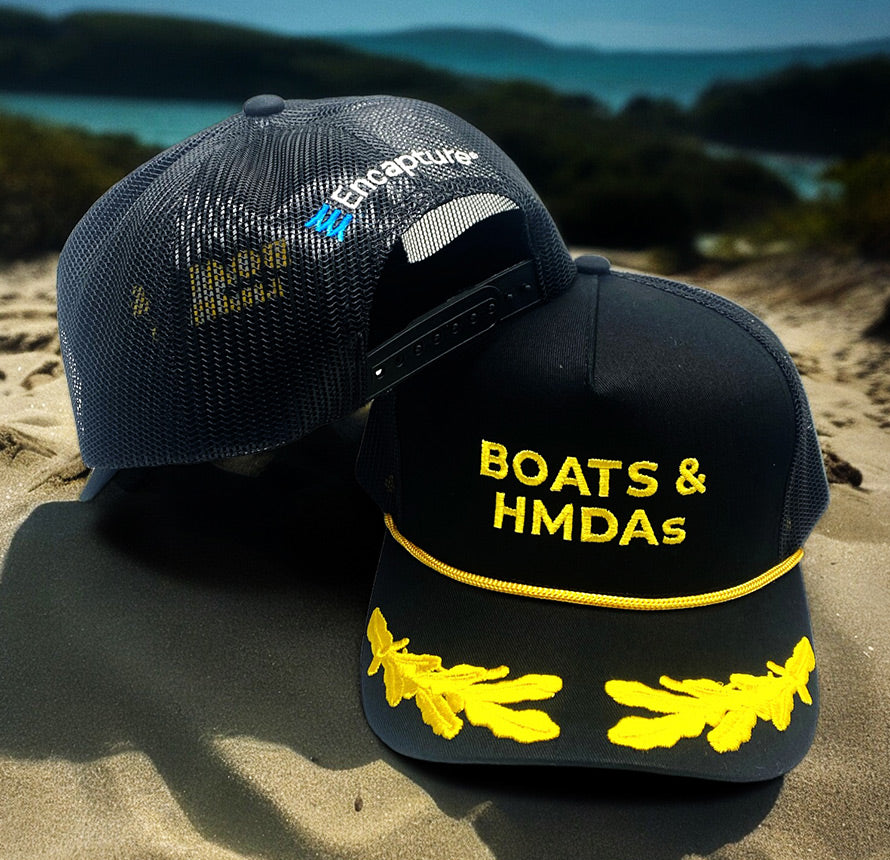Black mesh back hat with 'Boats & HMDAs' text and yellow accents.