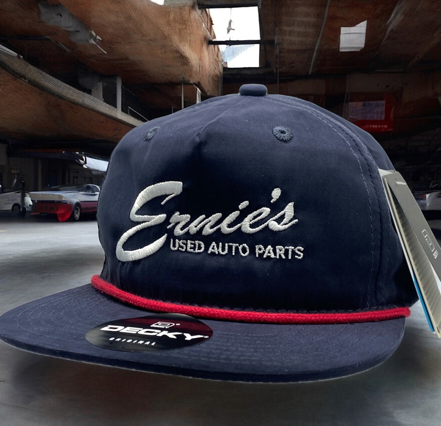 Navy Decky hat with 'Ernies Used Auto Parts' logo.