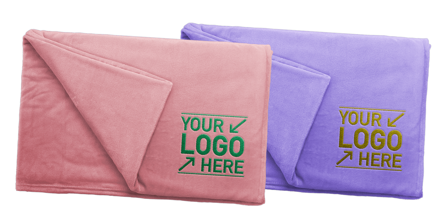 Two folded fleece blankets, one pink and one lavender, each embroidered with a sample logo.