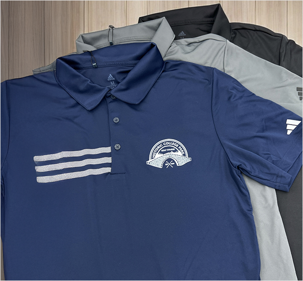 Assorted custom polo shirts featuring embroidered logos, ideal for corporate, team, or event branding, displayed in navy, gray, and black.