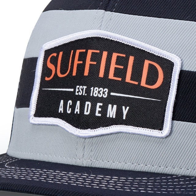Cap featuring "SUFFIELD ACADEMY EST. 1833" embroidered patch in orange and black