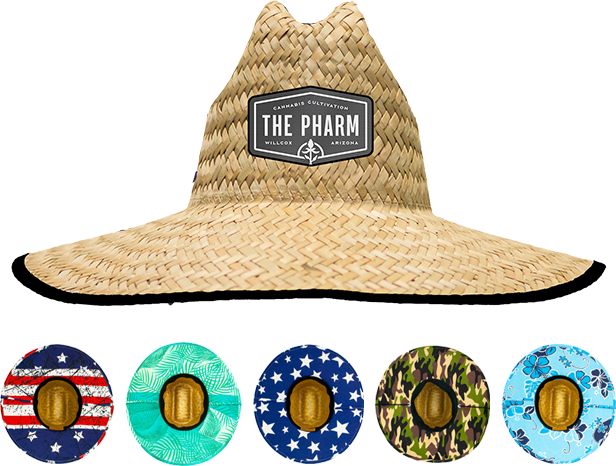 A straw hat with a custom 'The Pharm' patch, accompanied by five circular hat patches featuring various patterns: American flag, tropical, stars, camouflage, and floral.