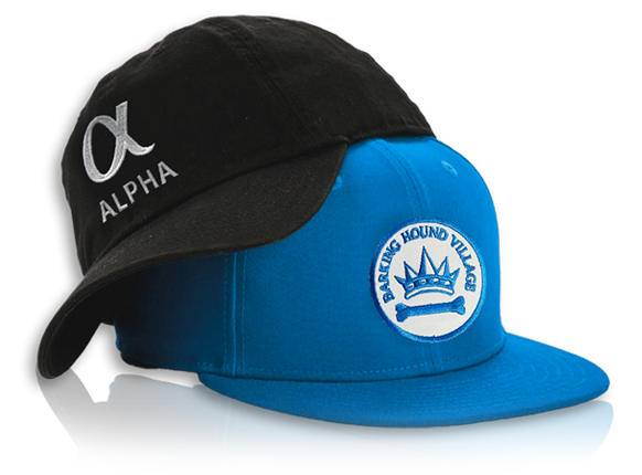 Two-tone cap with a blue crown, displaying 'Barking Hound Village' logo, and a black brim with 'Alpha' text in white.